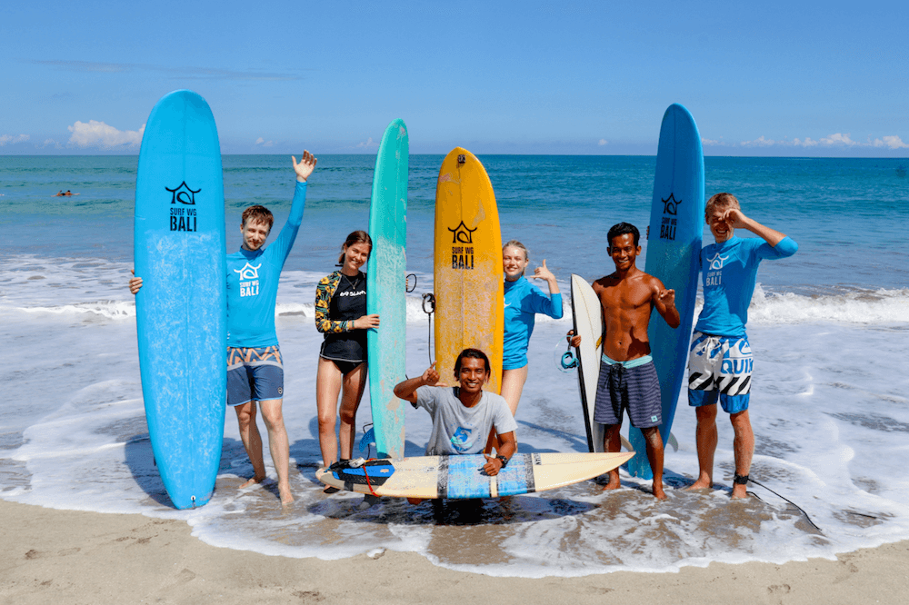 SurfWG surf camp guides and guests on the beach